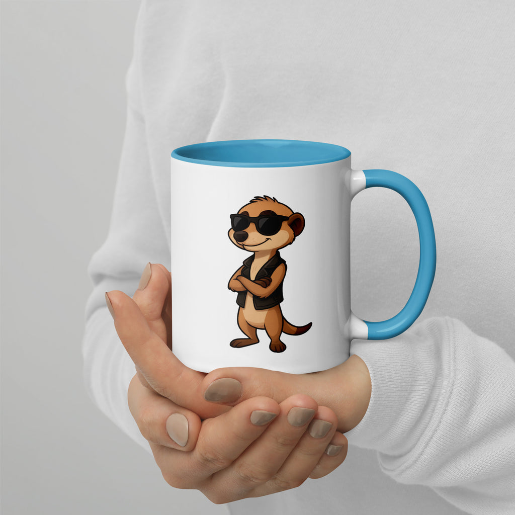 Person holding a mug with a cartoon character design on a plain background